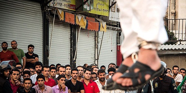 Public executions in Iran are often witnessed by children and are meted out for offenses such as homosexuality and drug possession. (Courtesy: Iran Human Rights)
