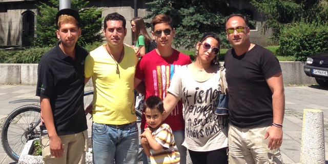 Omid Salehi, (l.), and five family members have moved to Bulgaria, where they can practice their faith in peace.
