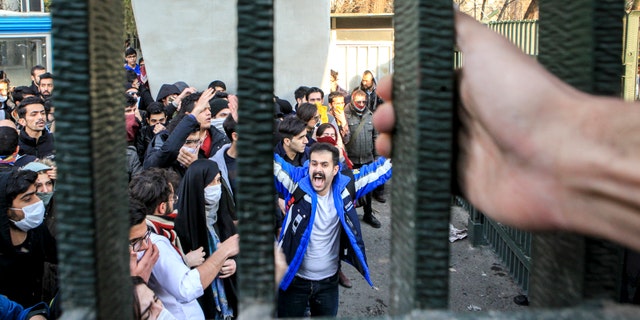In this Dec. 30, 2017 file photo, taken by an individual not employed by the Associated Press and obtained by the AP outside Iran, university students attend an anti-government protest inside Tehran University, in Tehran, Iran. (AP Photo, File)