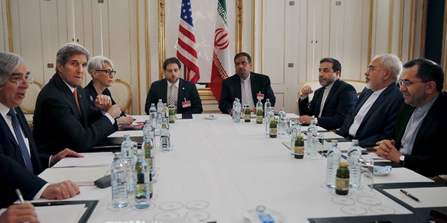 U.S. Secretary of Energy Ernest Moniz, U.S. Secretary of State John Kerry and U.S. Under Secretary for Political Affairs Wendy Sherman (L-3rd L) meet with Iranian Foreign Minister Mohammad Javad Zarif (2nd R) at a hotel in Vienna, Austria June 28, 2015.