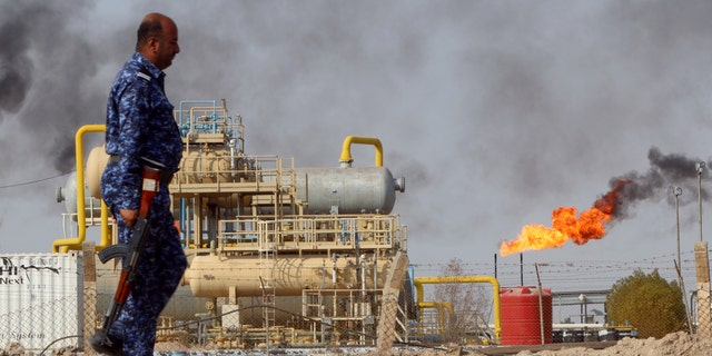 A member from the Oil Police Force is seen at Nahran Umran field norh of Basra, Iraq September 8, 2017.