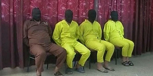 June 1, 2013: Four suspects believed to be involved in the chemical weapons plot are seen at a news conference in Iraq.