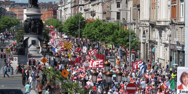 A Saturday, July 6, 2013 file photo showing thousands of anti-abortion protesters filling Dublin's major thoroughfare, as they march against Ireland's abortion bill. (AP Photo/Shawn Pogatchnik, File)