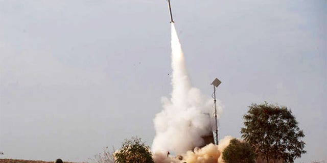 An Israeli Iron Dome interceptor shoots skyward toward an incoming rocket. (AP)