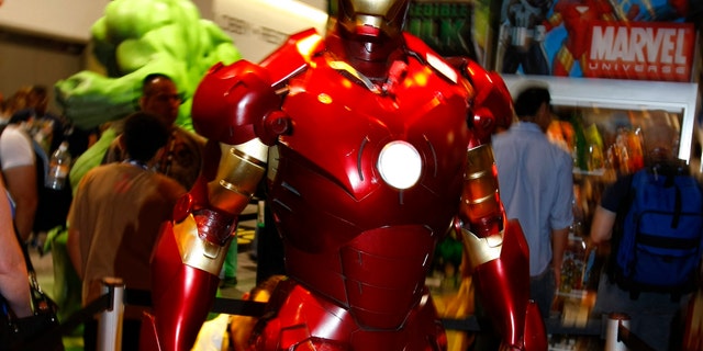 A life size "Iron Man" is on display in the Marvel booth at the 39th annual Comic Con Convention in San Diego July 24, 2008. More than 125,000 people are expected to attend the four-day event and indulge in a veritable feast of the latest in comic-related books, movie toys, games and memorabilia. REUTERS/Mike Blake (UNITED STATES) - RTX83HV