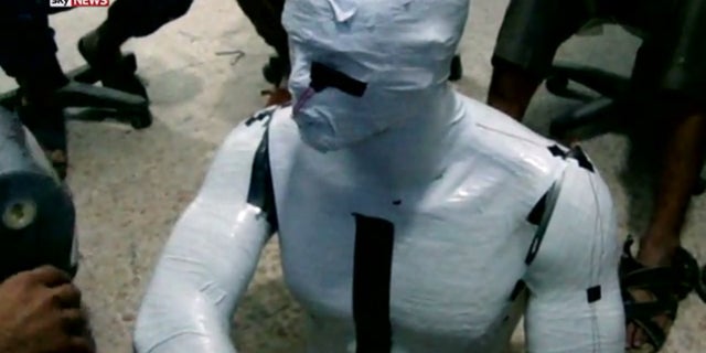 A mannequin used to "drive" a car rigged with explosives.