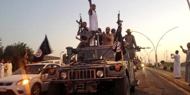 ISIS fighters near Mosul in 2014.