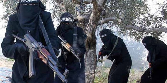 A brigade of women enforce Sharia law in the Islamic State stronghold of Raqqa. (Reuters)