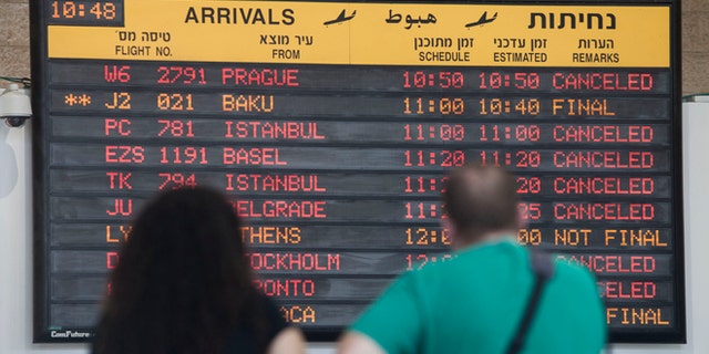 July 23, 2014: A arrivals flight board displays various canceled and delayed flights in Ben Gurion International airport a day after the U.S. Federal Aviation Administration imposed a 24-hour restriction on flights after a Hamas rocket landed Tuesday within a mile of the airport, in Tel Aviv, Israel.
