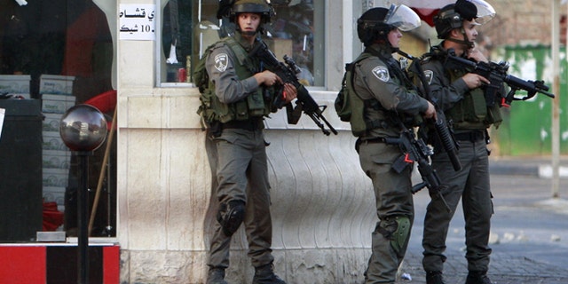 June 19, 2014: Israeli soldiers search for three missing Israeli teens believed to have been abducted in the West Bank city of Jenin. Since the operation to locate the teens began a week ago, about 280 Palestinians have been arrested, the military said, including 200 members of Hamas.