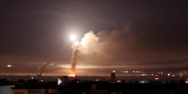 Missile fire is seen from Damascus, Syria, May 10, 2018.