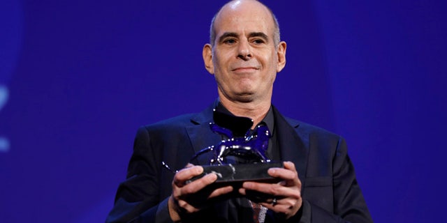 Samuel Moaz is awarded the jury's special Silver Lion prize for "Foxtrot" at the 74th Venice Film Festival.