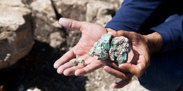 Small fragments of the raw glass as they were found at the site.(Photo: Assaf Peretz, courtesy of Israel Antiquities Authority)