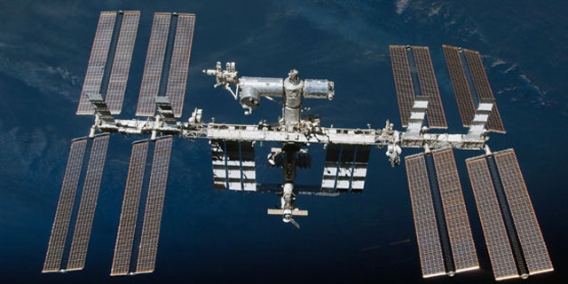 A huge particle detector to be mounted on the International Space Station next year could find evidence for the anti-universe often evoked in science fiction, physicists said.