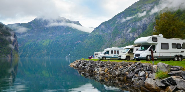 Motorhomes at campsite by the Geirangerfjord in Norway