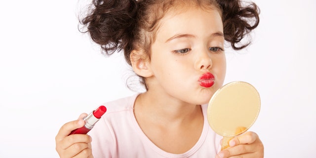 A viral video of a 3-year-old perfectly applying her makeup has created backlash on social media that her mother wants to set straight.