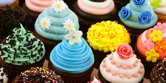 The teen spent $54 on cupcakes after another customer allegedly made offensive comments.
