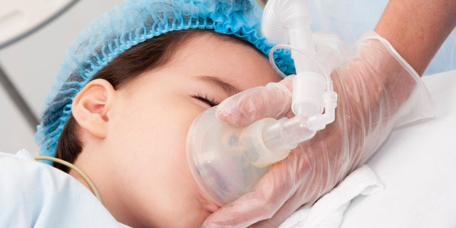 Cases of inflammatory condition, MIS-C, in children spike at pediatric hospital 4 Child patient receives artificial ventilation in hospital
