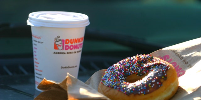 Brooklyn, New York, USA - April 12, 2014: A Dunkin Donuts coffee and doughnut.
