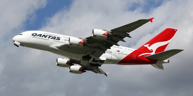 London Heathrow, United Kingdom - August 28, 2015: A Qantas Airways Airbus A380 with the registration VH-OQB taking off from London Heathrow Airport (LHR) in the United Kingdom. The Airbus A380 is the world's largest passenger airliner. Qantas is the flag carrier airline of Australia.