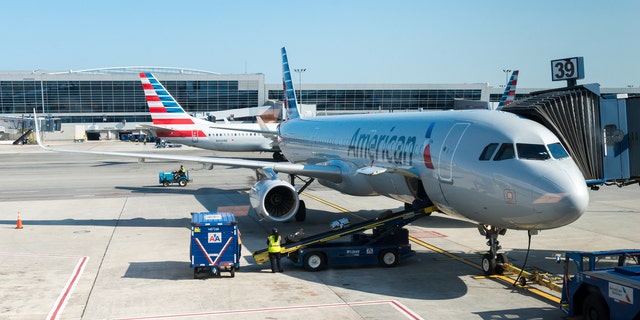 Six American Airlines crew members were transported to a local hospital after requesting medical evaluations, the airline said.