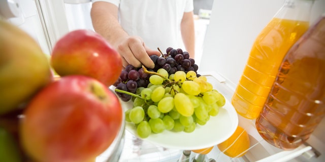 Grapes and apples in refrigerator ideal for diet