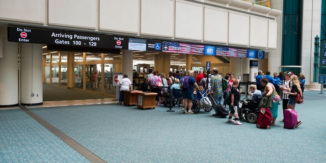 The passenger has a valid Florida concealed weapons license, but will still be charged with carrying a concealed weapon in a place prohibited by law.