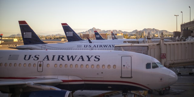 Phoenix, USA - August 24, 2014: US Airways aircraft at the airport of Phoenix, Arizona in the early morning