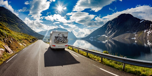 Caravan car travels on the highway.