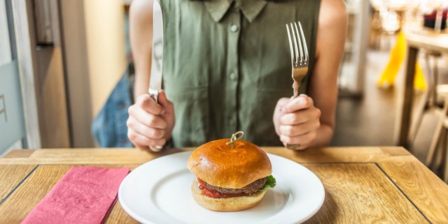 But new research suggests that you might be able to restore your burger’s splendor — by eating it with a fork.