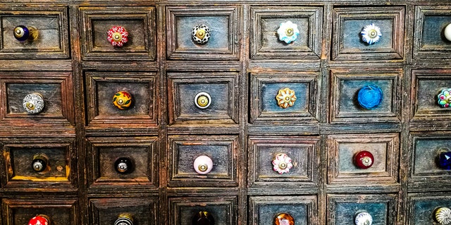 For a creative twist, try installing a statement knob or handle on a select cabinet door.