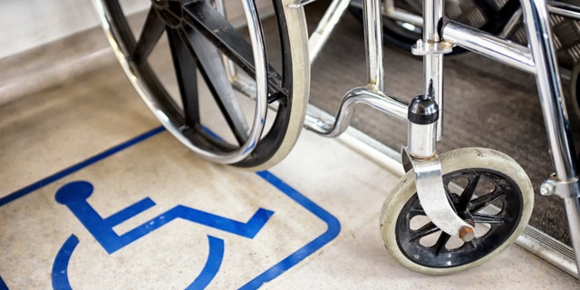 disabled sign and wheel chair - photo
