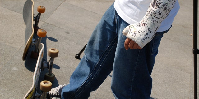 a young skater in Istanbul he has a very nice plaster in his wrist.