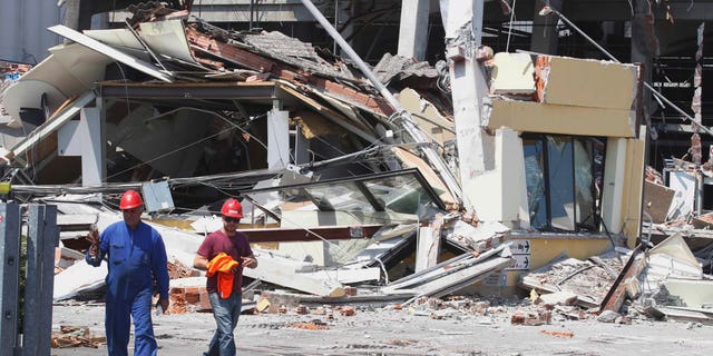The collapsed BBG industrial moldings building is seen in Mirandola, northern Italy, Tuesday, May 29, 2012.