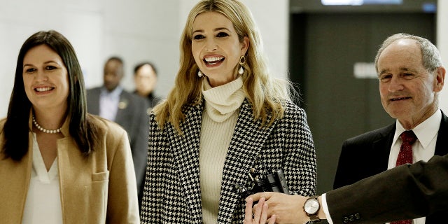 Ivanka Trump, daughter of U.S. President Donald Trump, arrives at the Incheon International Airport in Incheon, South Korea, Feb. 23, 2018. At left is White House press secretary Sarah Sanders.