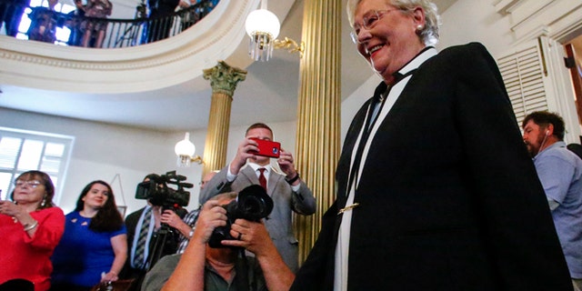 April 10, 2017: Kay Ivey walks in to be sworn in as the next Governor of Alabama in Montgomery, Ala.
