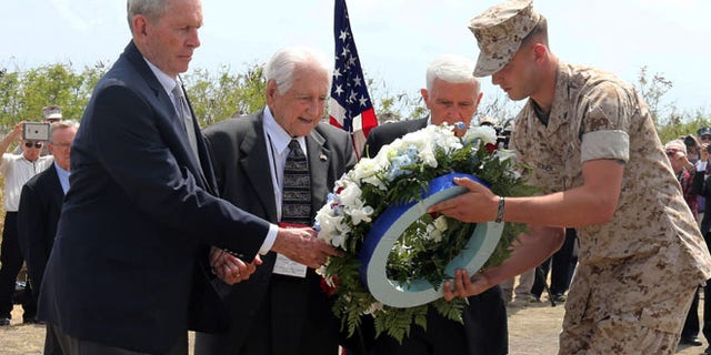 Mar. 21, 2015: U.S. veterans offer a wreath during a ceremony commemorating the 70th anniversary of the Battle of Iwo Jima on Iwo Jima, now known officially as Ioto, Japan. (AP)