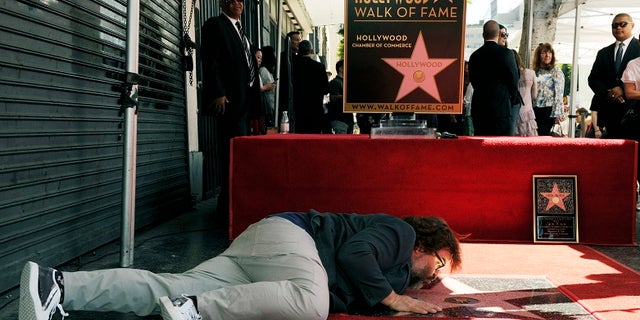 Jack Black is seen with his star on the Hollywood Walk of Fame.