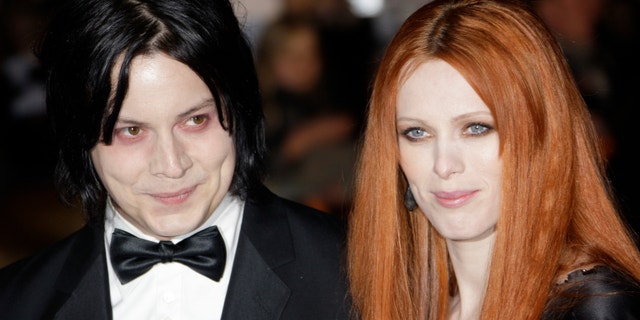 In this Oct. 29, 2008 file photo, musician Jack White, left, and Karen Elson arrive on the red carpet for the Royal World Premiere of the 22nd James Bond film, "Quantum of Solace" in London.