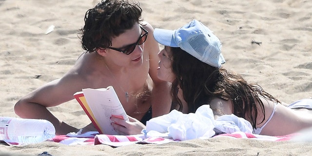 Jack Depp appears healthy on a beach with his girlfriend weeks after reports that he was battling a serious illness.