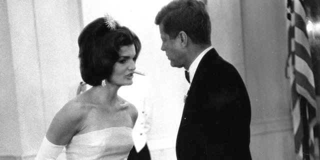 United States President John F. Kennedy and first lady Jackie Kennedy attend a dinner in honor of Andre Malraux, minister of state for cultural affairs of France, in Washington, in this handout image taken on May 11, 1962.