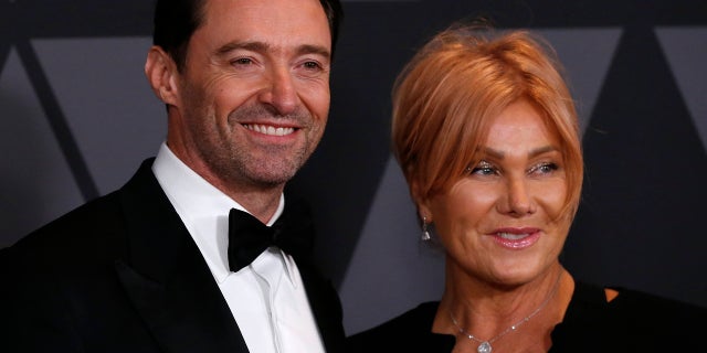 9TH Governors Awards Arrivals Los Angeles, California, U.S., 11/11/2017 - Actors and husband and wife Hugh Jackman and Deborra-lee Furness. REUTERS/Mario Anzuoni - HP1EDBC0C5WAJ