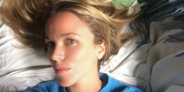 NFL heiress Jacqueline Kent Cooke was charged with assault after allegedly hurling an anti-Semitic slur and hitting a lawyer with her purse.