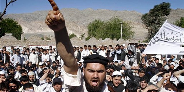 Afghan protestors shout anti-U.S. slogans during a demonstration in Jalalabad, Afghanistan, April 3.