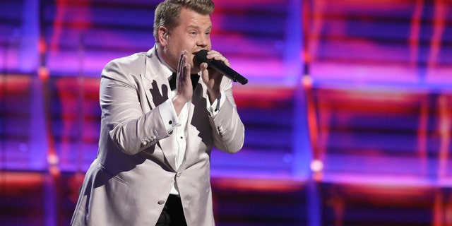 Host James Corden raps at the 59th annual Grammy Awards on Sunday, Feb. 12, 2017, in Los Angeles.