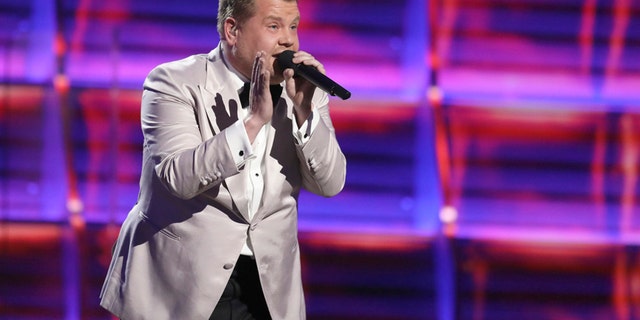 Host James Corden raps at the 59th annual Grammy Awards on Sunday, Feb. 12, 2017, in Los Angeles.