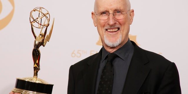 Actor James Cromwell from FX's miniseries "American Horror Story: Asylum" poses backstage with his award for Outstanding Supporting Actor In A Miniseries Or A Movie at the 65th Primetime Emmy Awards in Los Angeles September 22, 2013. REUTERS