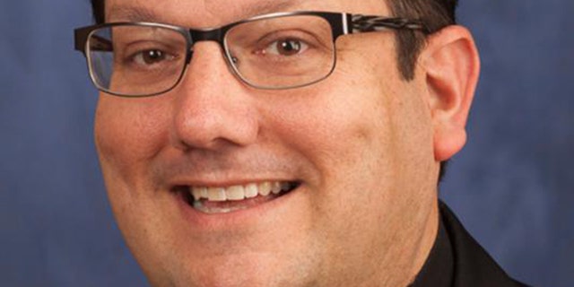 The Catholic Diocese of Columbus says Rev. James Csaszar was being investigated for 'questionable text and telephone communications with a minor.'