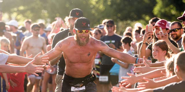 Thousands of people came out to congratulate James Lawrence as he finished his final 26.2 in Utah.