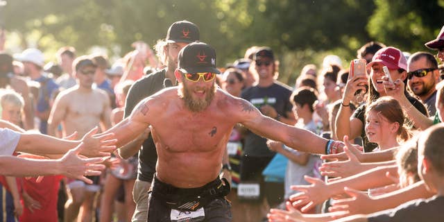 Thousands of people came out to congratulate James Lawrence as he finished his final 26.2 in Utah.